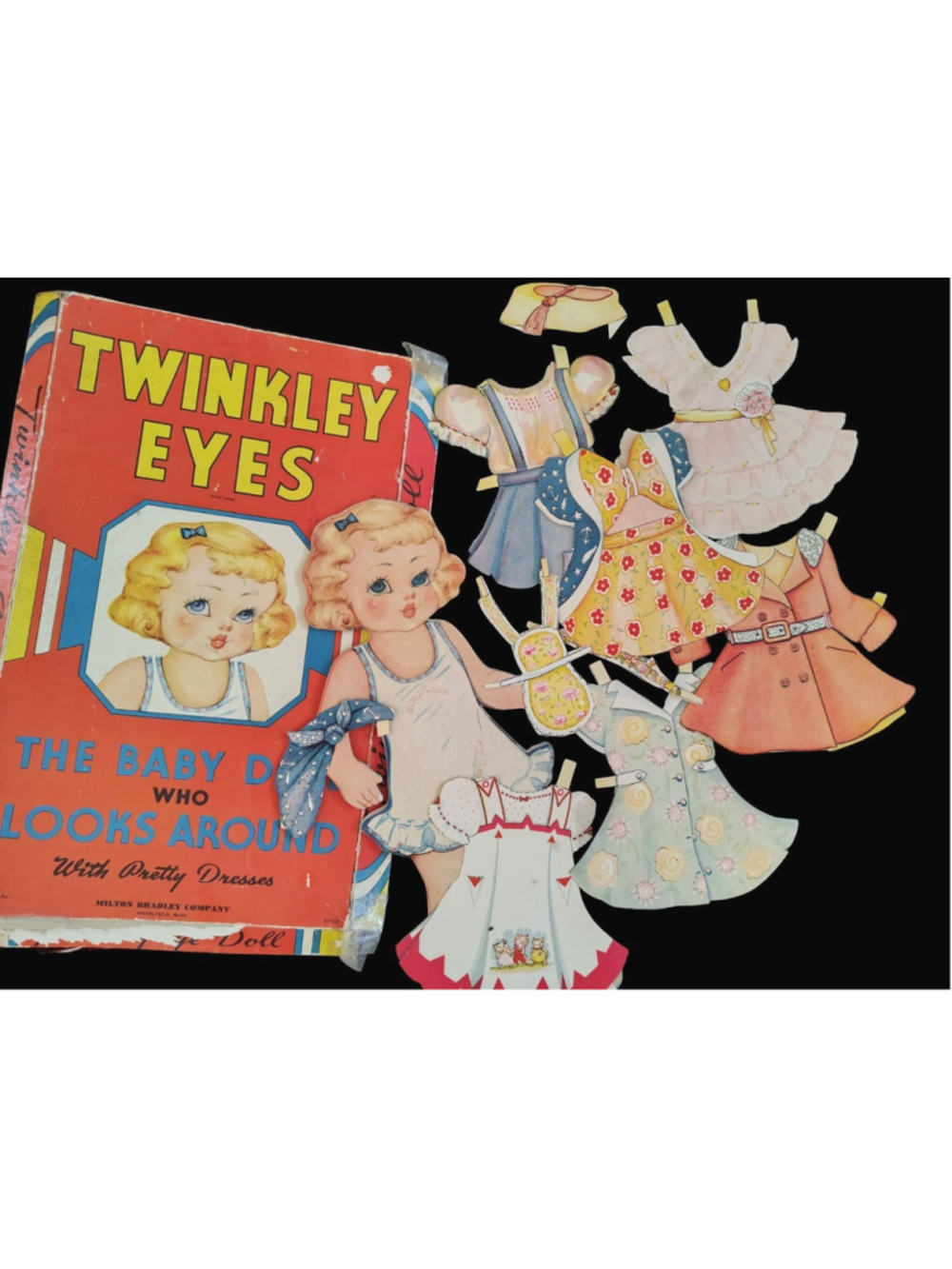 Vintage 1940s "Twinkley Eyes" Milton Bradley Dress up paper clothes board doll